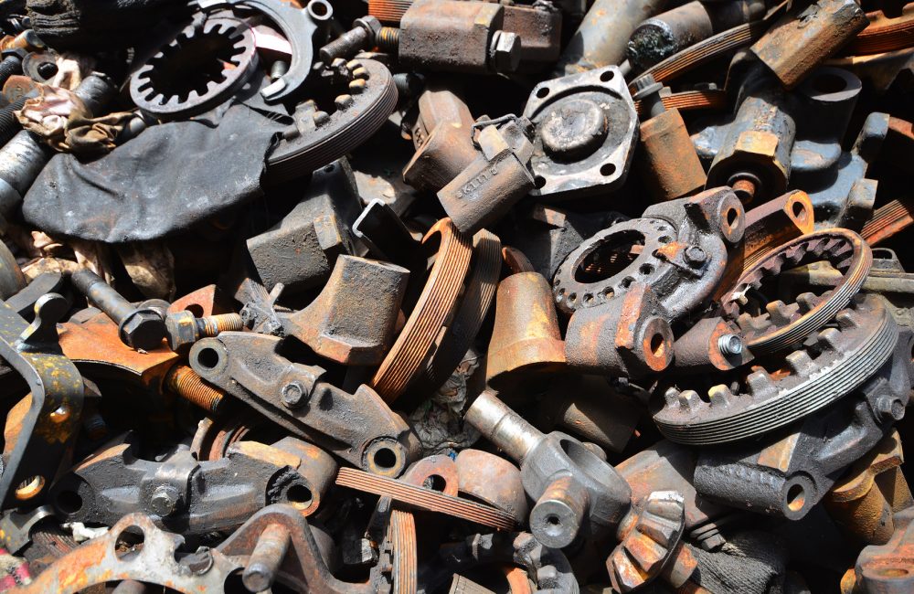 Pile of old motor parts scrap metal for recycling